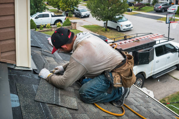 Professional Roofing technician working in Clayville, RI